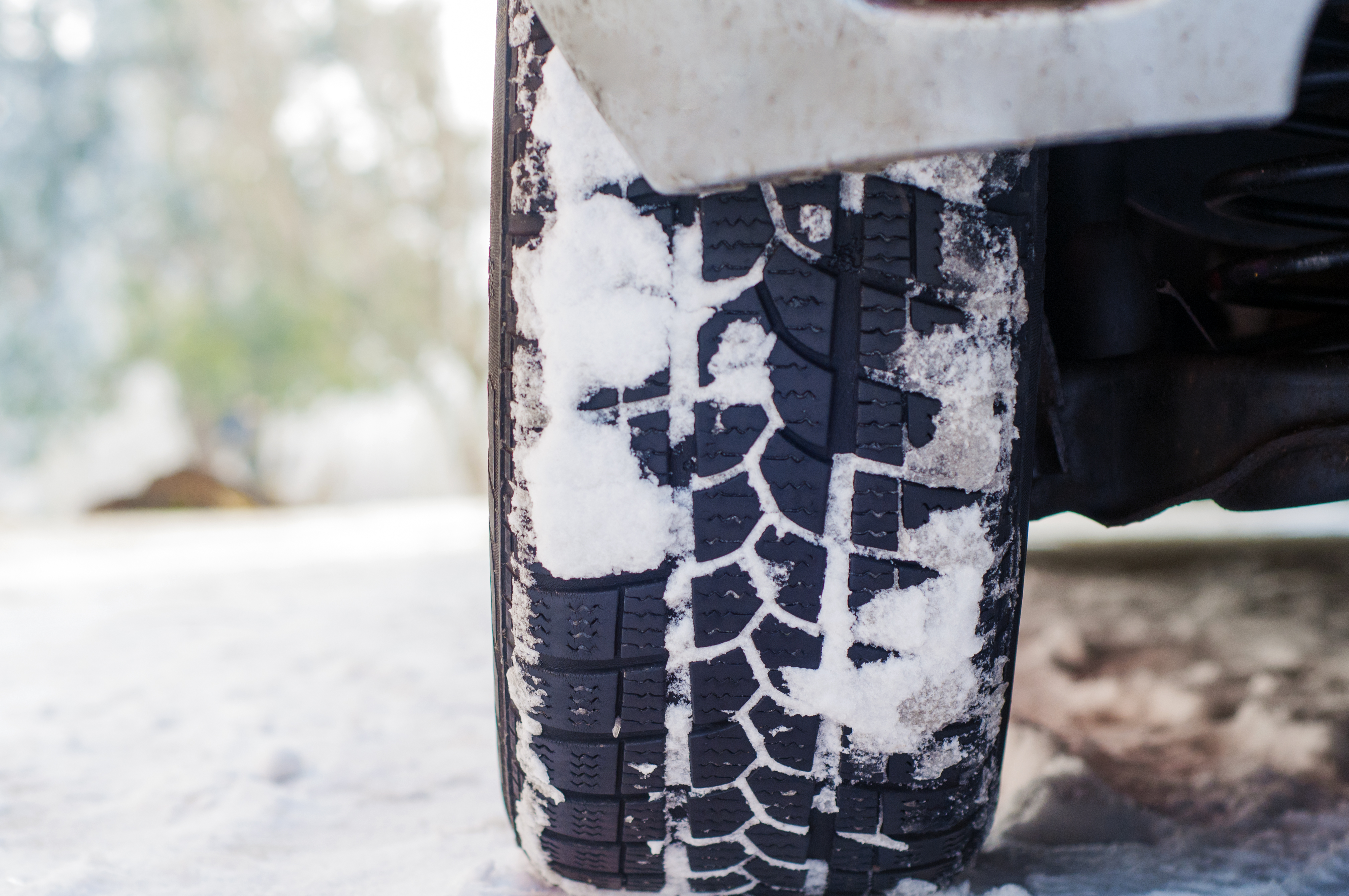 car-tires-winter-road-covered-with-snow-vehicle-snowy-alley-morning-snowfall.jpg