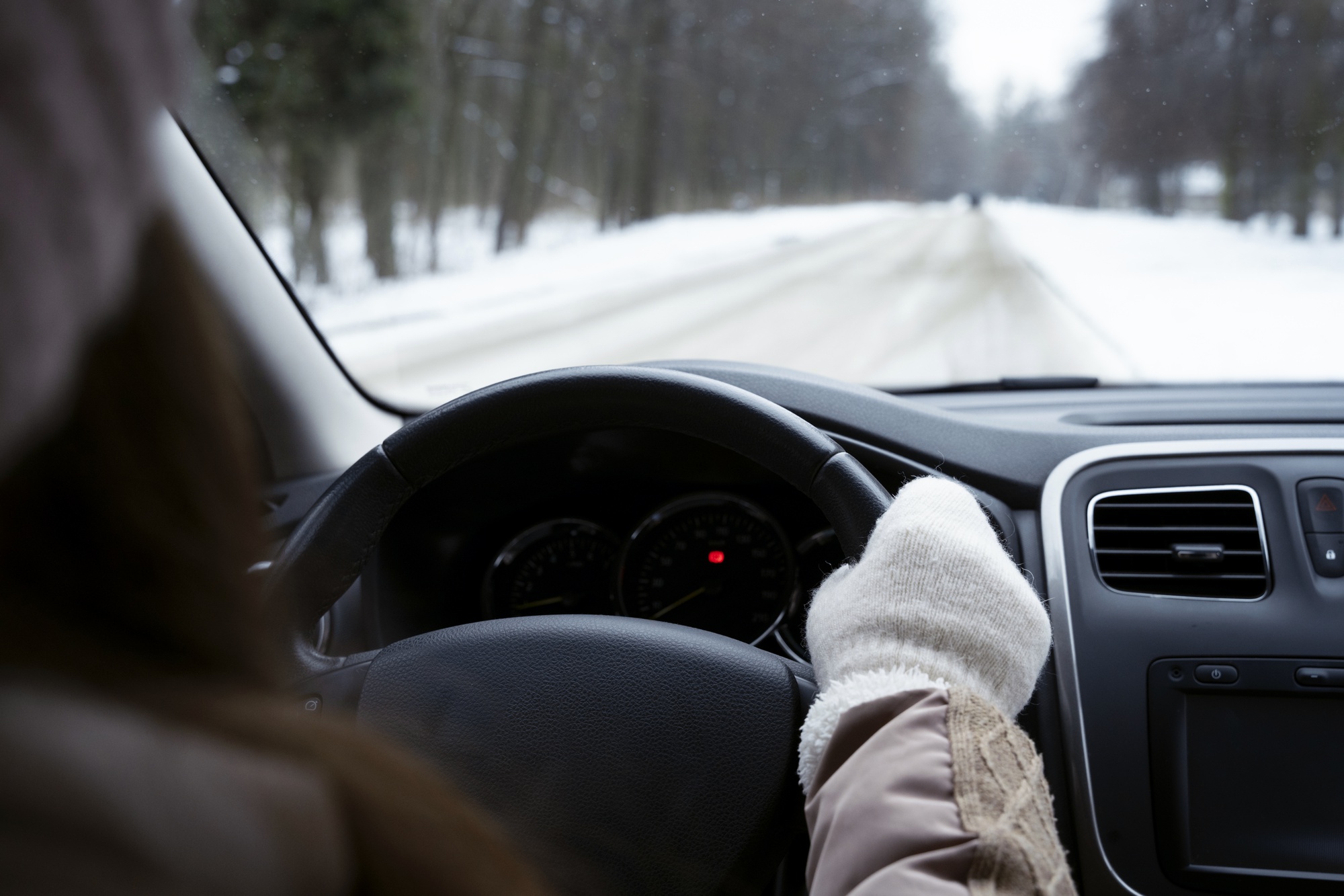 close-up-woman-driving-winter-season.jpg